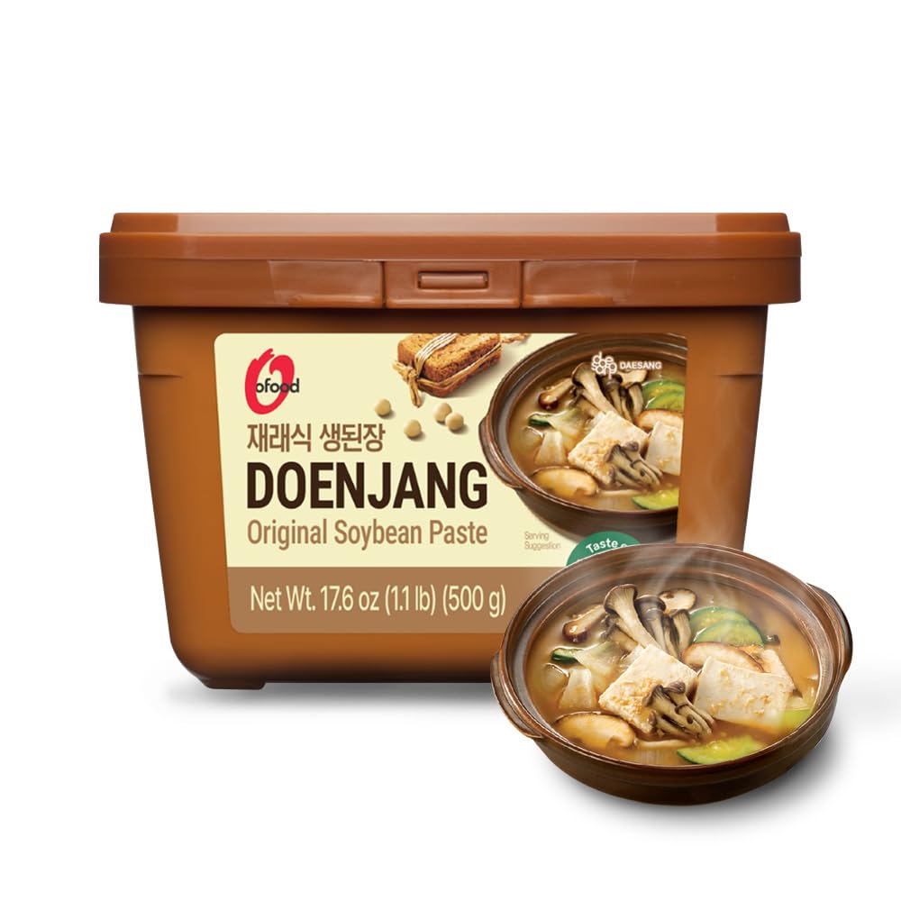 Chung Jung One Doenjang bottle pouring rich flavor for soups and stews.