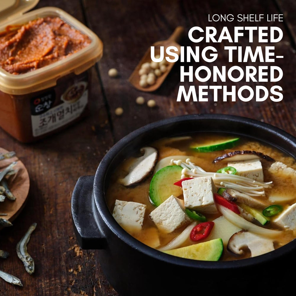Chung Jung One Doenjang jjigae pot steaming with aromatic steam.