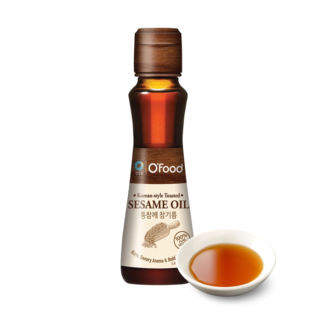Chung Jung One Premium Sesame Oil bottle-pour adds rich roasted aroma to cooking.