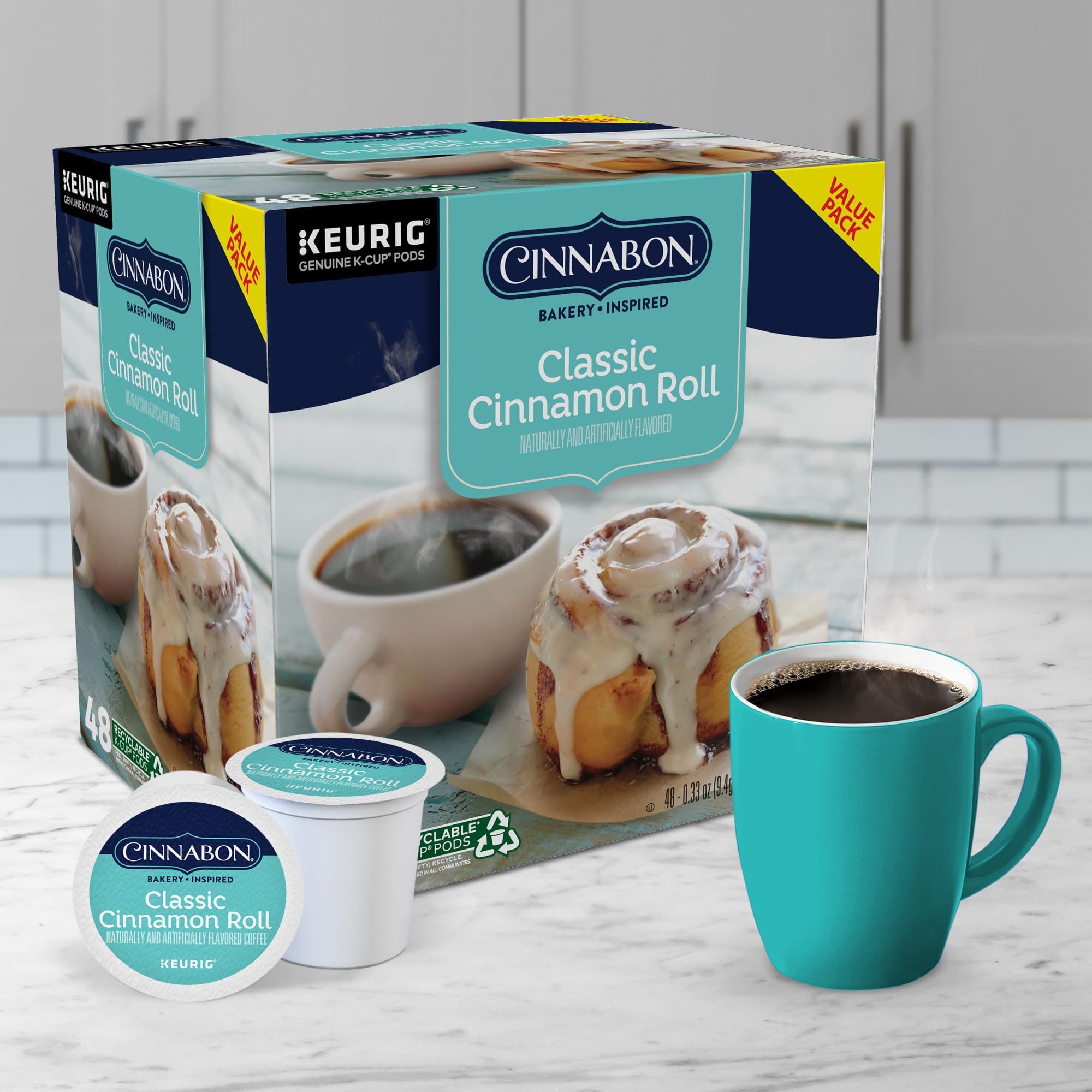 Frosting swirl visible in cup to evoke CINNABON flavor.
