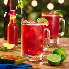 Clamato Original Bloody Caesar prep emphasizes savory, seafood-inspired cocktail option.
