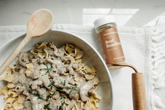 Clean Monday Meals bouillon powder dissolving in hot water for quick stock