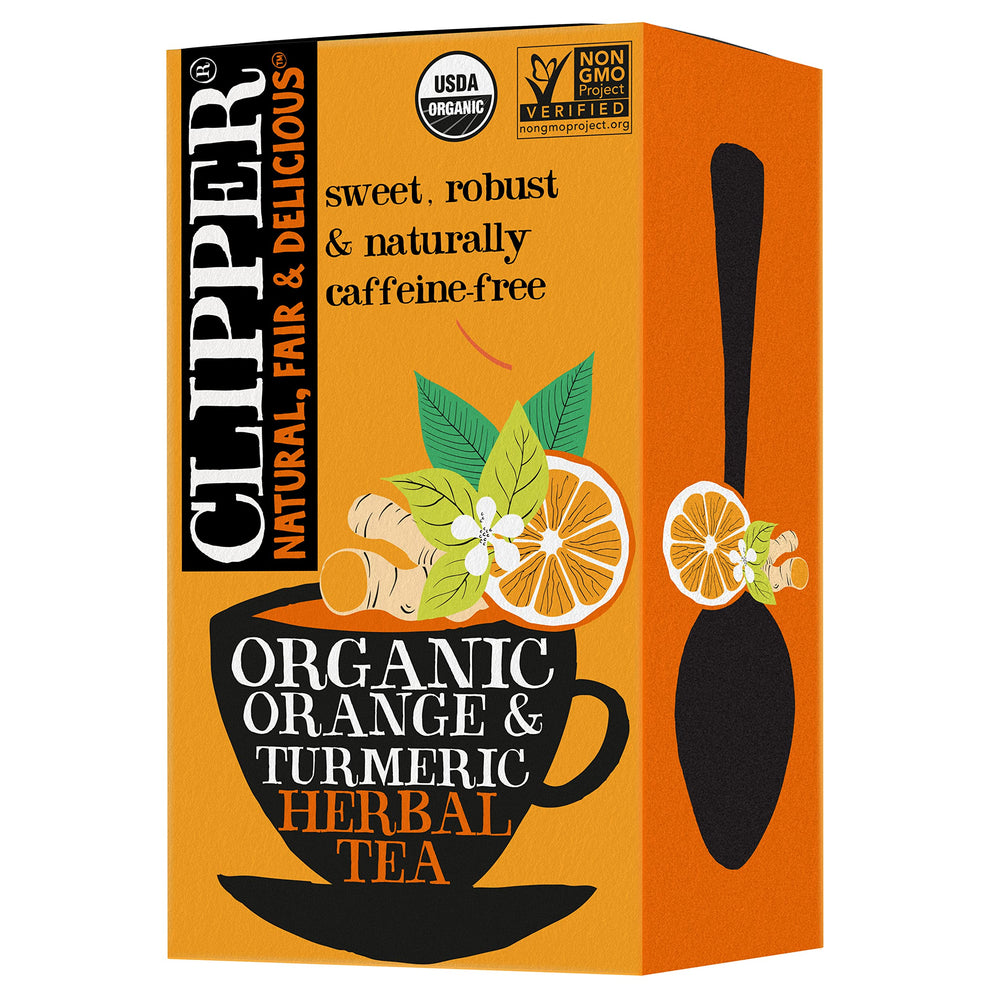 Clipper Tea Orange & Turmeric tea bag on a saucer for caffeine-free comfort.