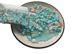 Clonynix Blue Ocean Sprinkles with shells add coastal decoration to desserts.