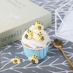 Clonynix bee toppers atop cupcakes boost color and celebration vibe