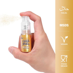 Cobakey gold edible glitter spray decorating cocktails with shimmering appeal.