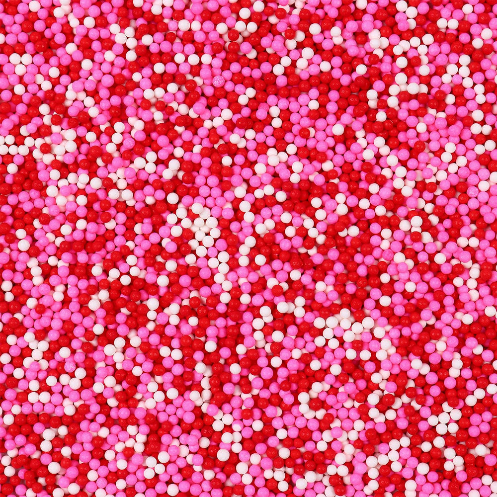 Cobakey Valentine Sprinkles in a 7oz jar with pink, white, and red nonpareils for cake decoration.