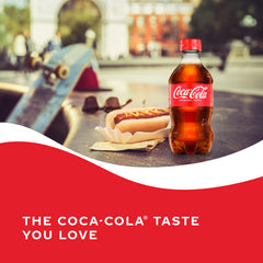 Coca-Cola ice-cold pour into a glass for refreshment.