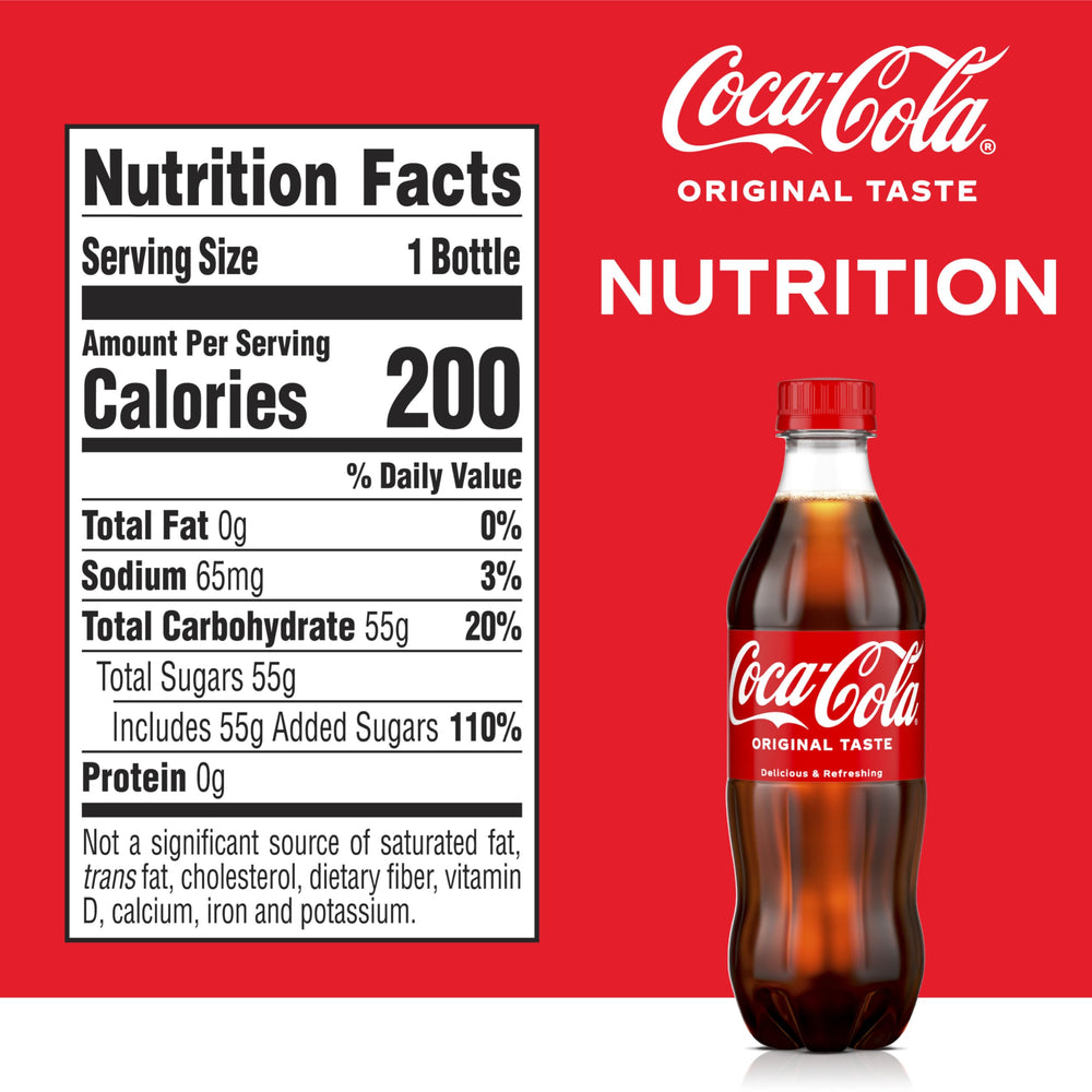 Coca-Cola original-taste bottle pour close-up showing fizz and refreshment