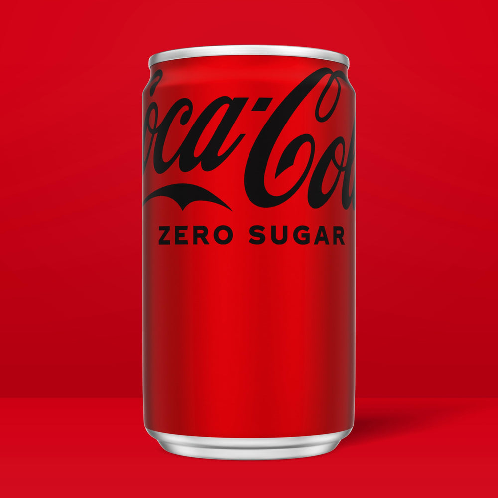 Coca-Cola Zero Sugar pour, satisfying aroma and fizz at meals.