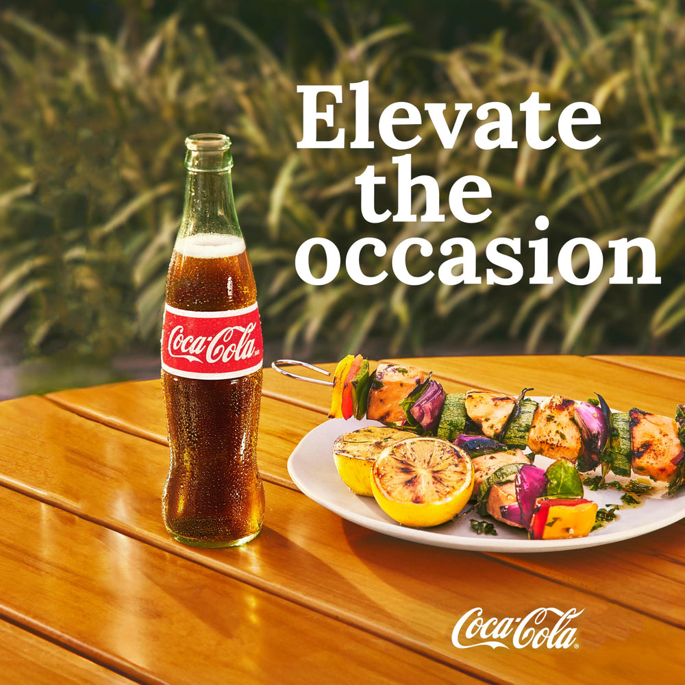 Coca-Cola Zero Sugar refreshing glass, perfect for break-time moments.