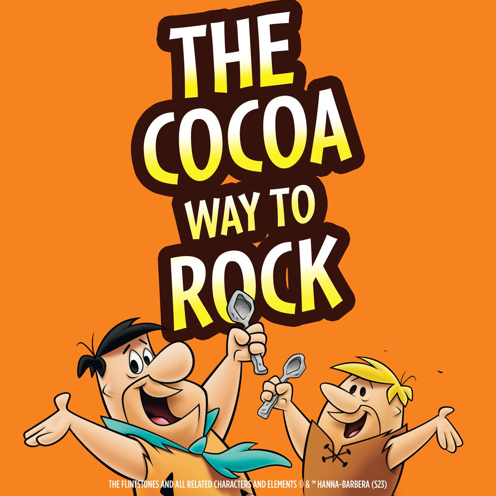 Kids enjoying Cocoa PEBBLES with milk at the table