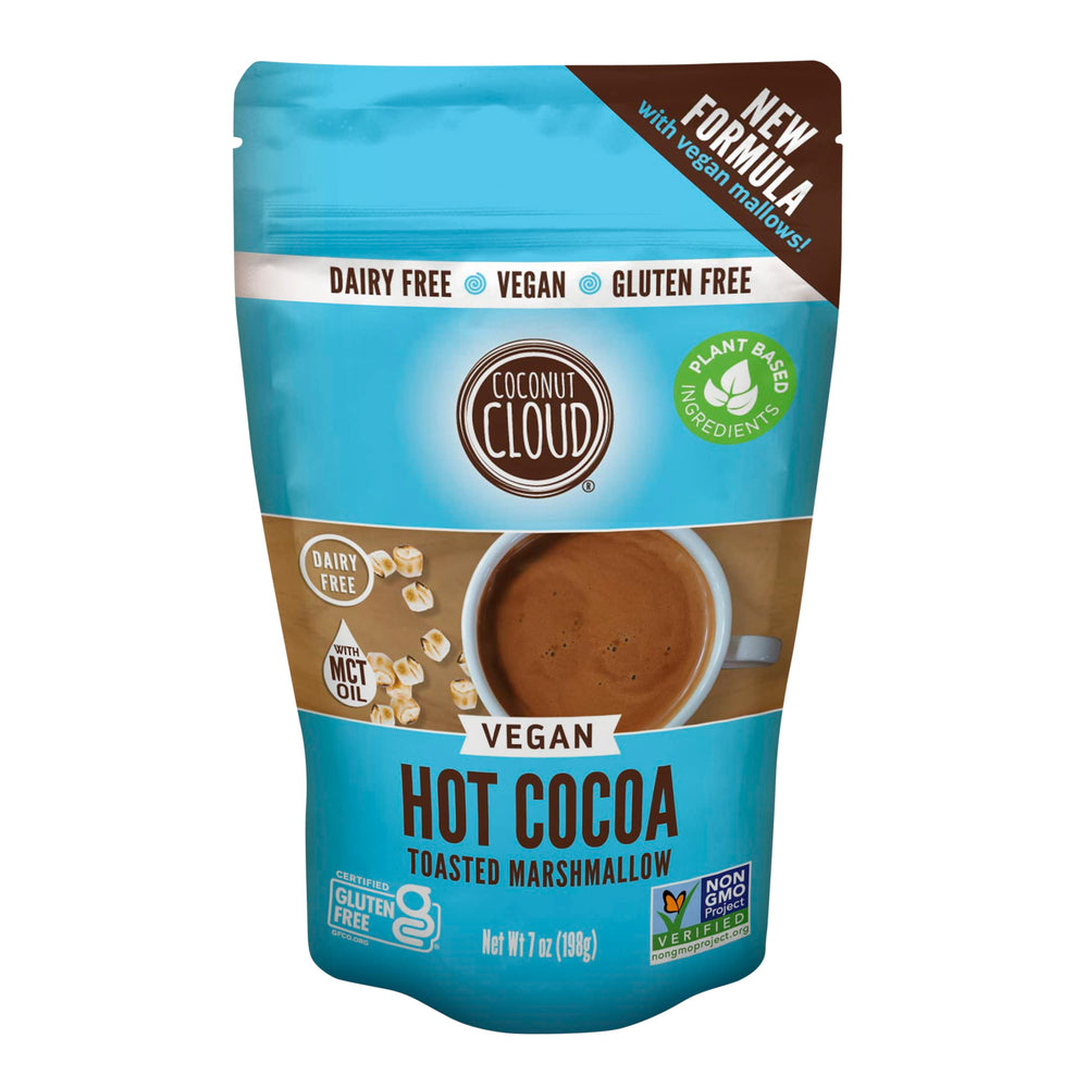 Coconut Cloud hot cocoa packaging beside a mug for a creamy, dairy-free treat.