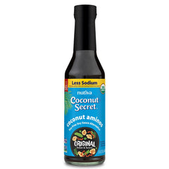 Coconut Secret Coconut Aminos bottle pours, a low-sodium soy sauce substitute in action