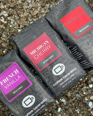 A steaming cup showing inviting cherry notes from Coffee Beanery Michigan Cherry.