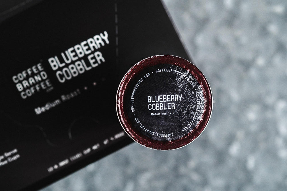 Coffee Brand K-Cup Brewing Pod demonstrates quick convenience for busy mornings.