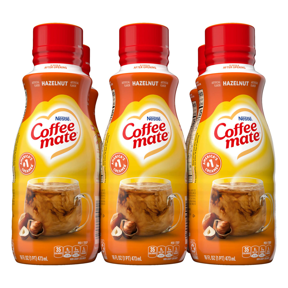 Coffee Mate Hazelnut Creamer pour into a cup for creamy coffee