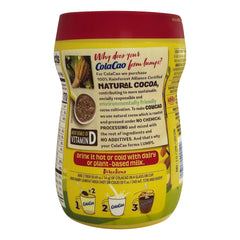 ColaCao cocoa powder mix cup with prepared hot chocolate.
