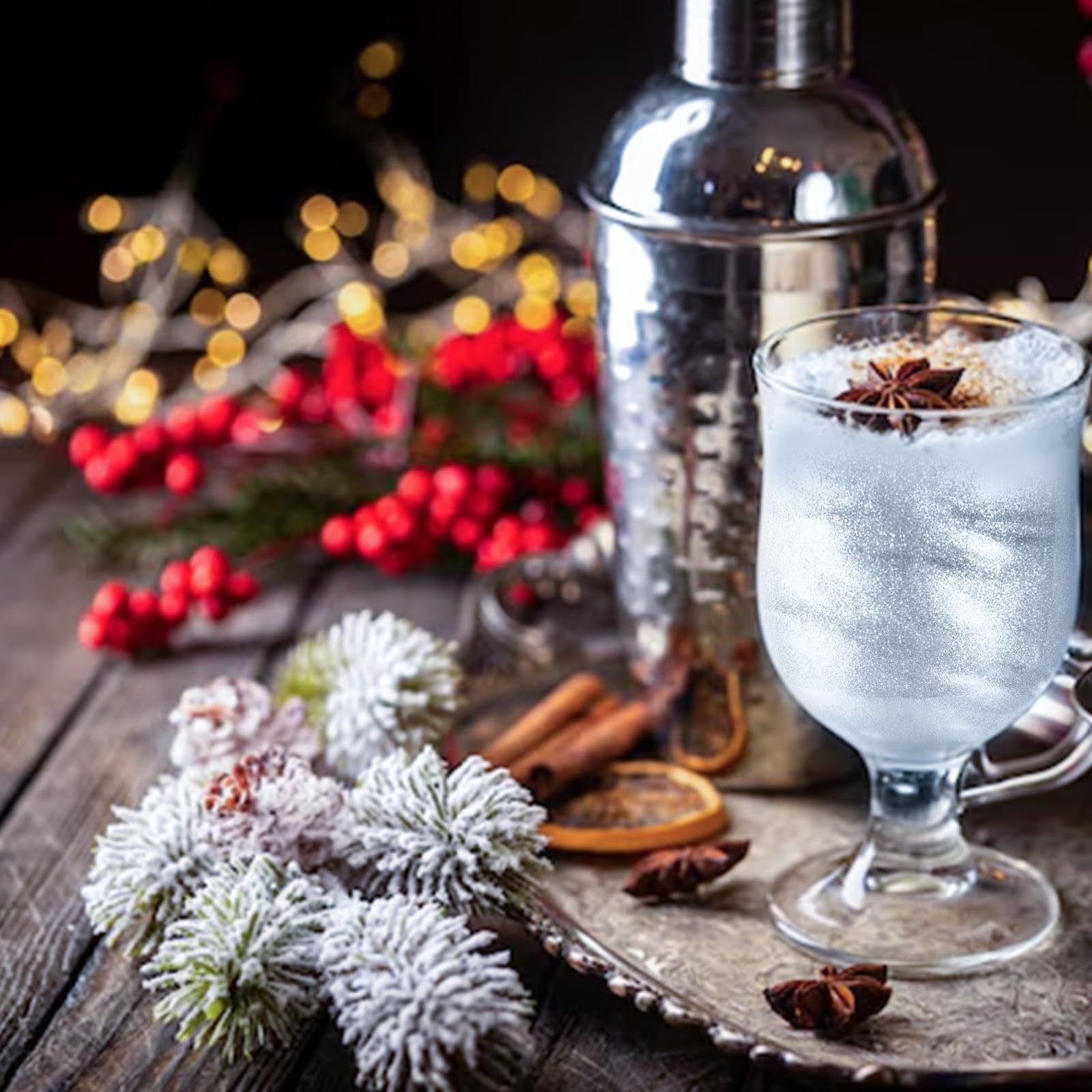 Colaele Silver Edible Glitter Spray dusts fruit for party-ready presentation.