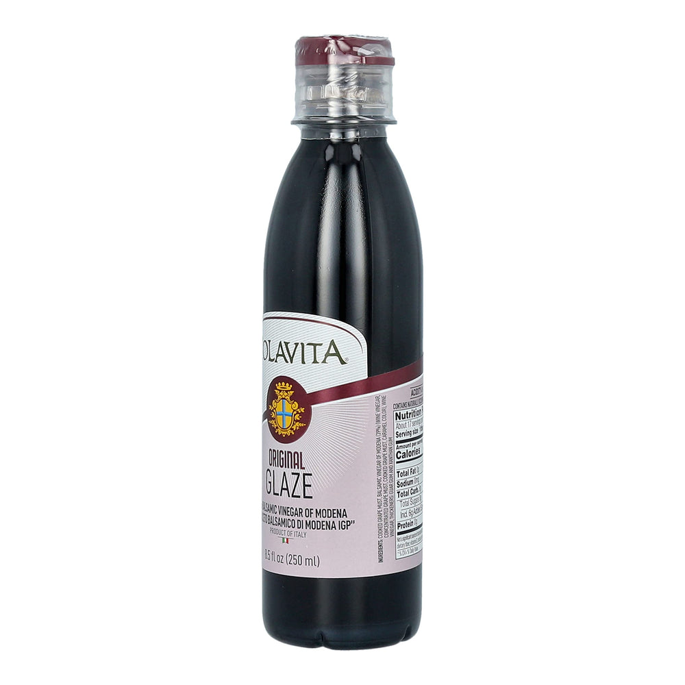 Colavita Balsamic Glaze pairs with cheeses on a platter.