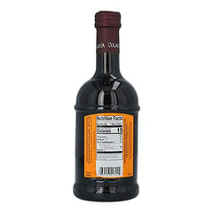 Colavita balsamic Modena being poured, perfect for deglazing and glaze finishes.