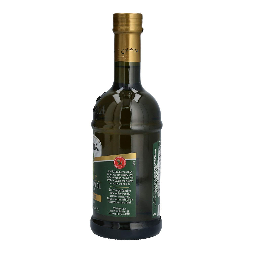 Colavita EVOO drizzled over vegetables, ideal for roasting and sautéing.