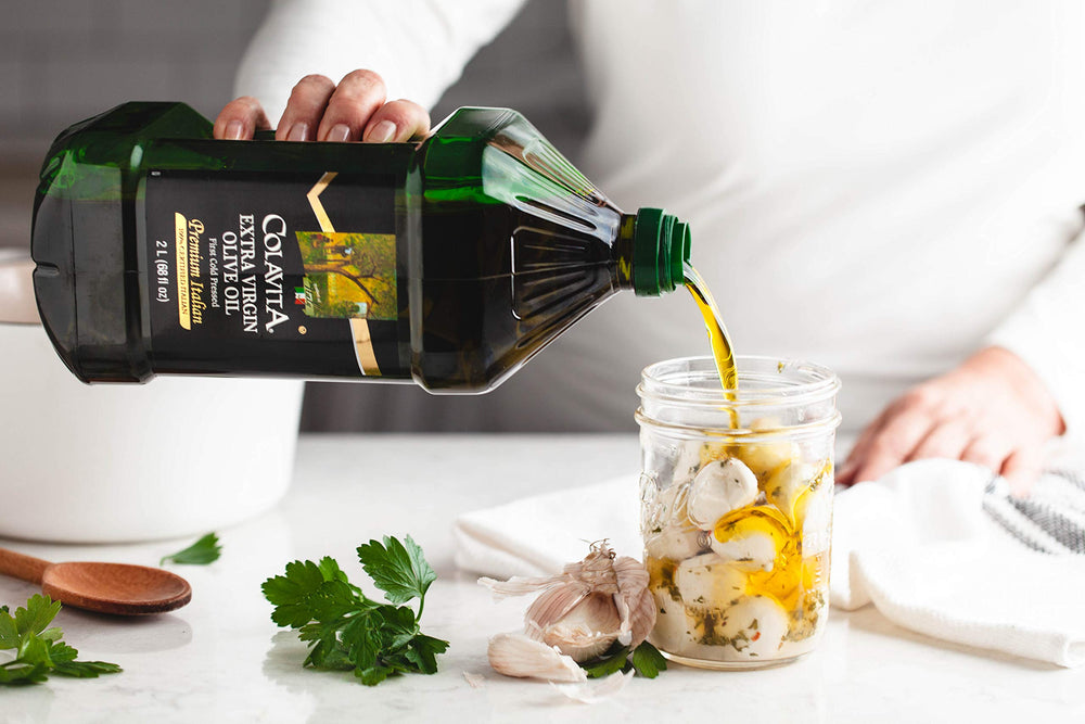 Colavita olive oil drizzled over meats and seafood