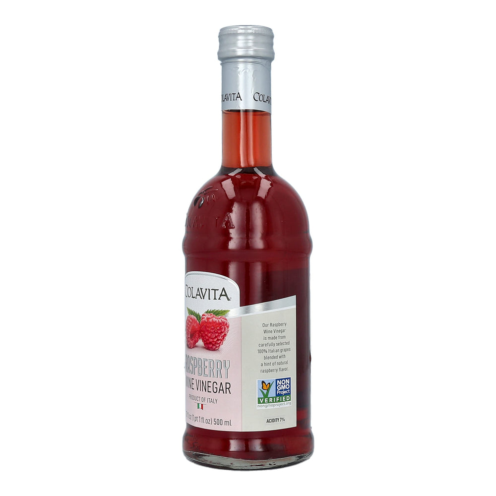 Dressing bowl featuring Colavita Raspberry Red Wine Vinegar for salads