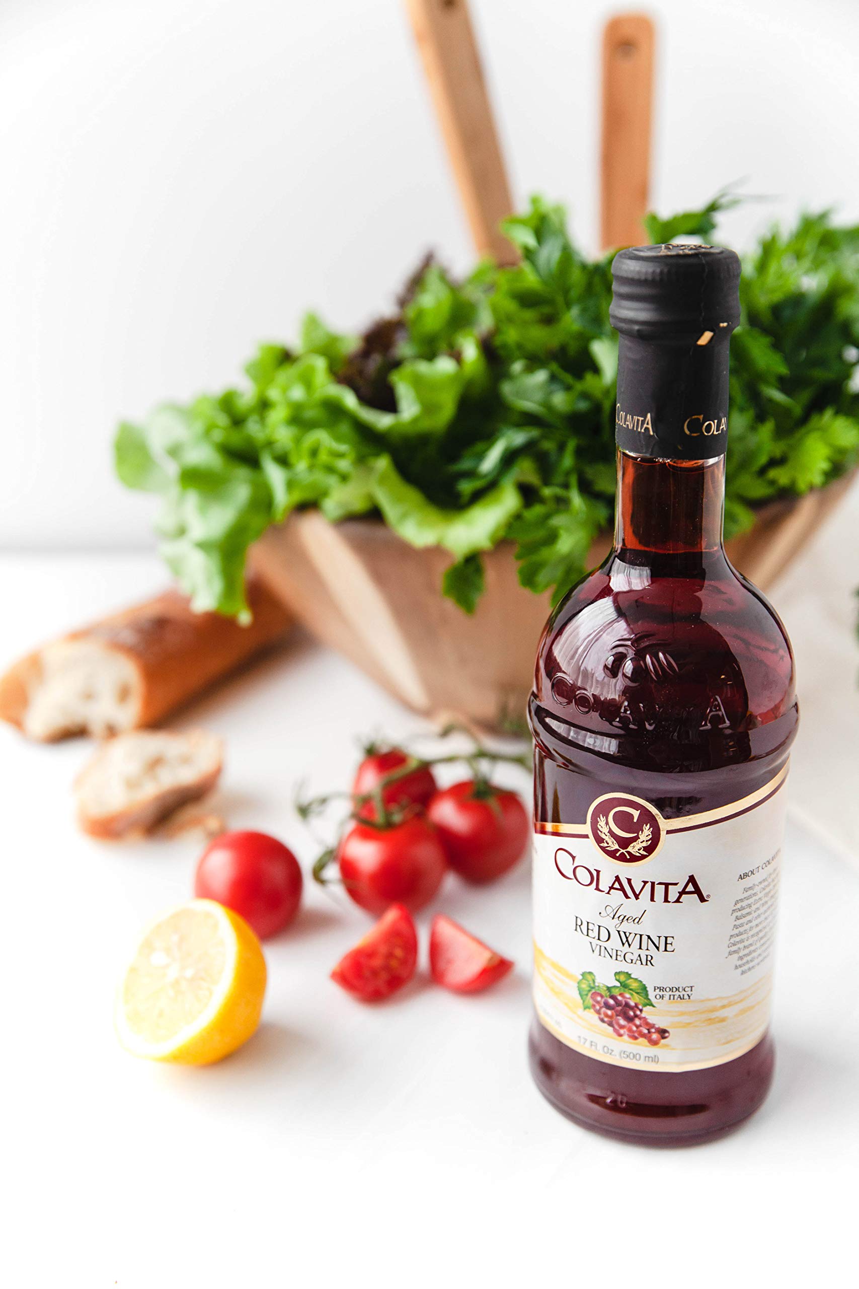 Colavita red wine vinegar aging barrel image suggesting traditional aging.