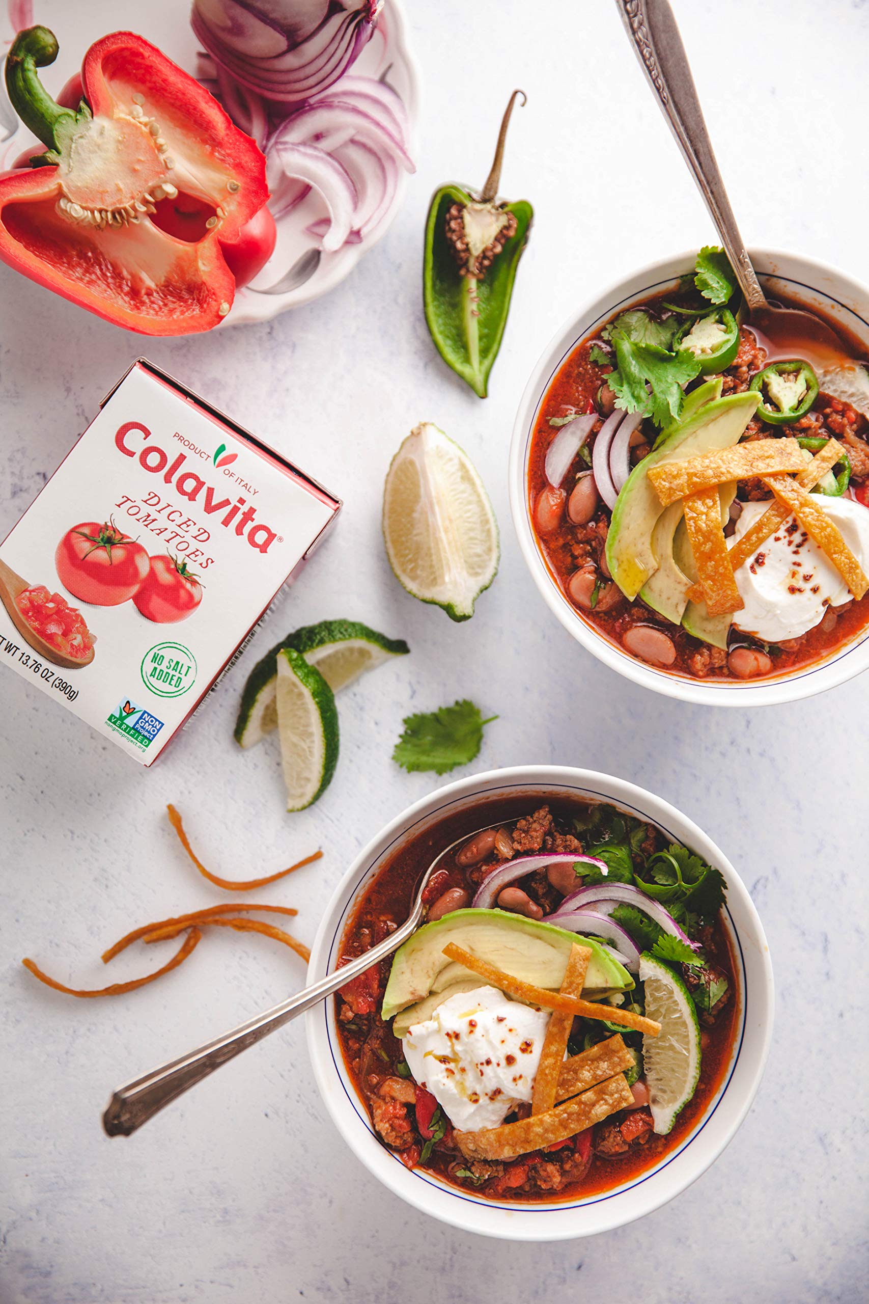Colavita tomatoes for pasta sauces; vibrant color enhances dish.