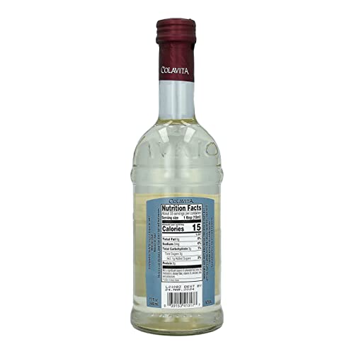 COLAVITA White Balsamic Vinegar pouring into a glass, ideal for dressings and glazes.