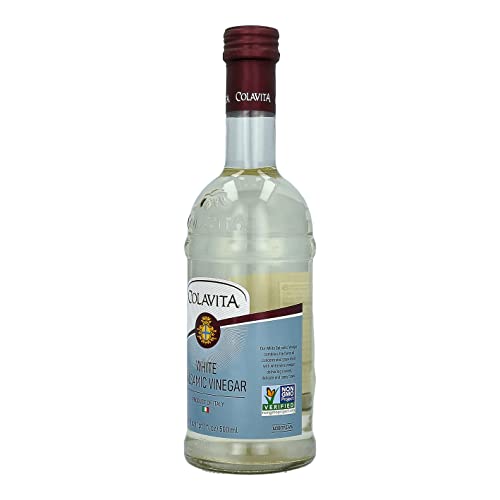 COLAVITA White Balsamic Vinegar over salad bowl, elevating flavors without overpowering greens.