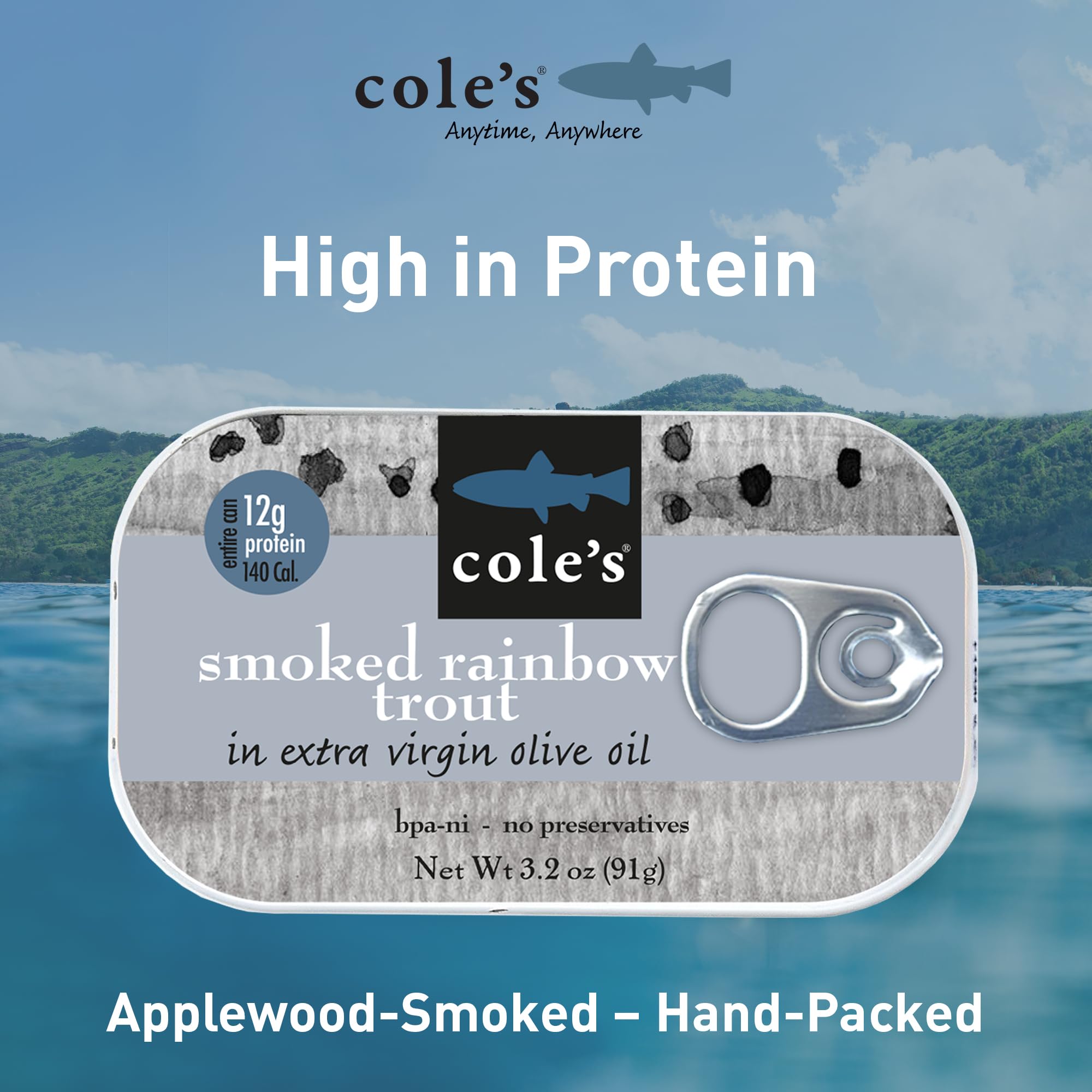 Opened Cole's smoked trout can with olive oil ready for serving.