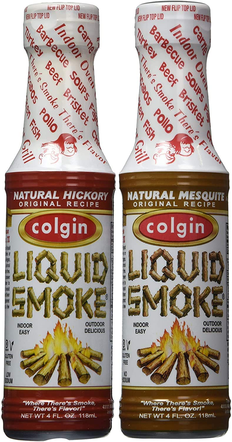 Colgin Hickory Liquid Smoke bottle pour for rich smoked flavor on meats.