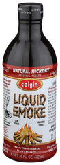 Colgin Liquid Smoke bottle pour showcases a rich, outdoor-inspired flavor ready for grilling.