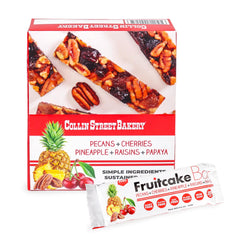 Collin Street Bakery fruitcake bar unwrap shows chewy texture for a quick snack