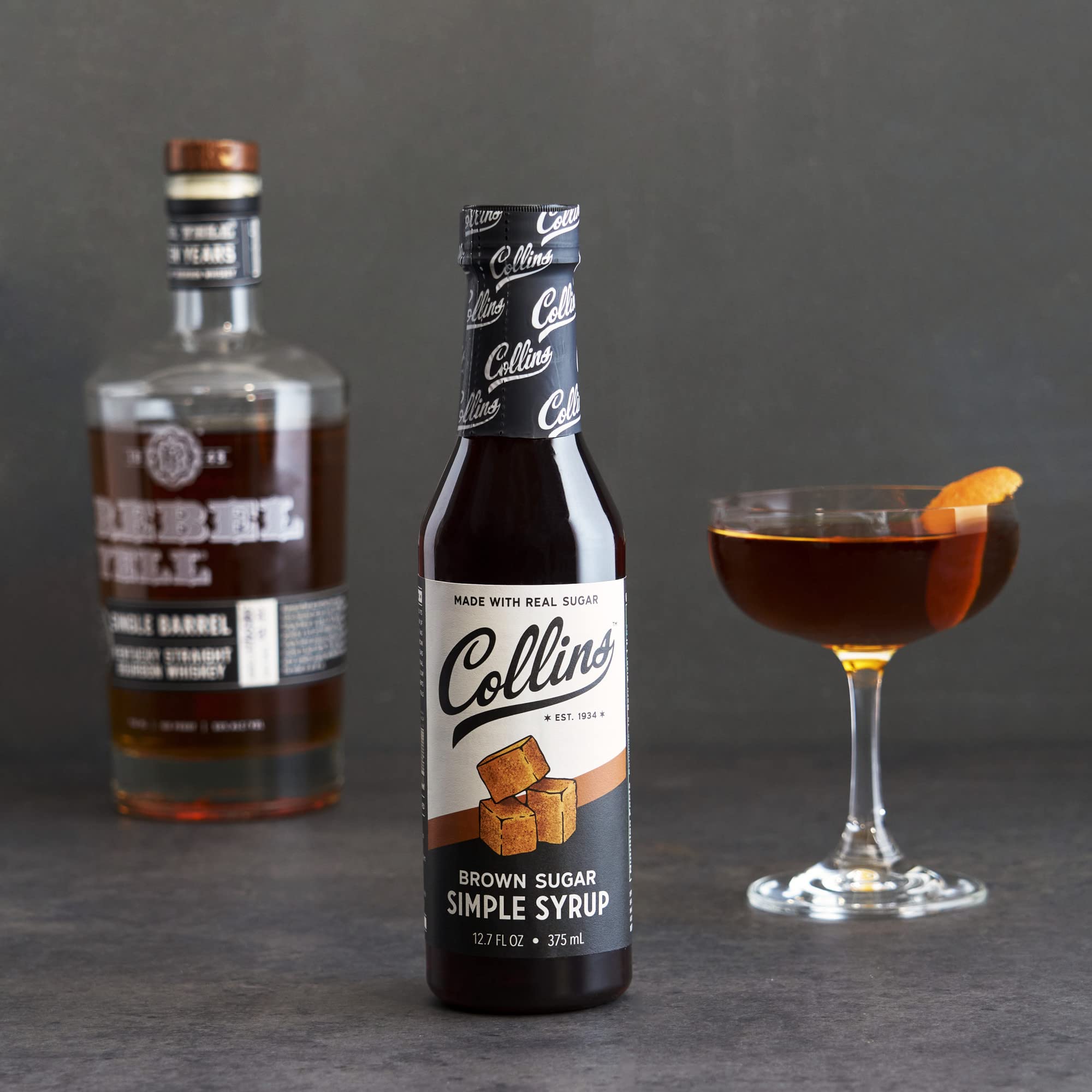 Gift-ready Collins syrup bottle for home bartenders.