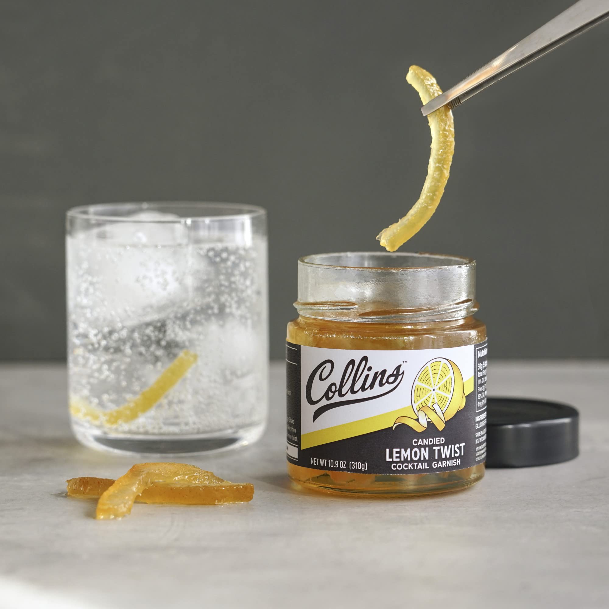 Collins Candied Lemon Twist drizzle on drink adds subtle sweetness.