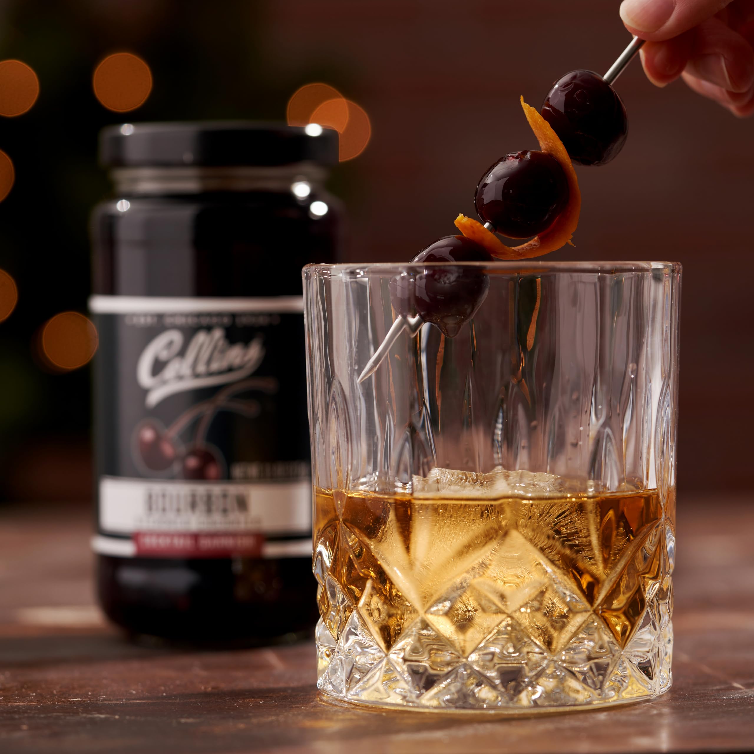 Collins Chicago bourbon cherries used as a milkshake topping or dessert accent.