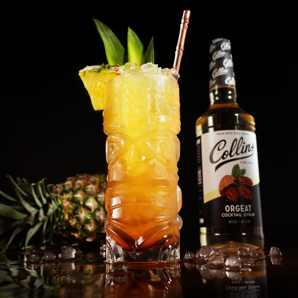 Collins Orgeat Syrup on a home bar setup for craft cocktails