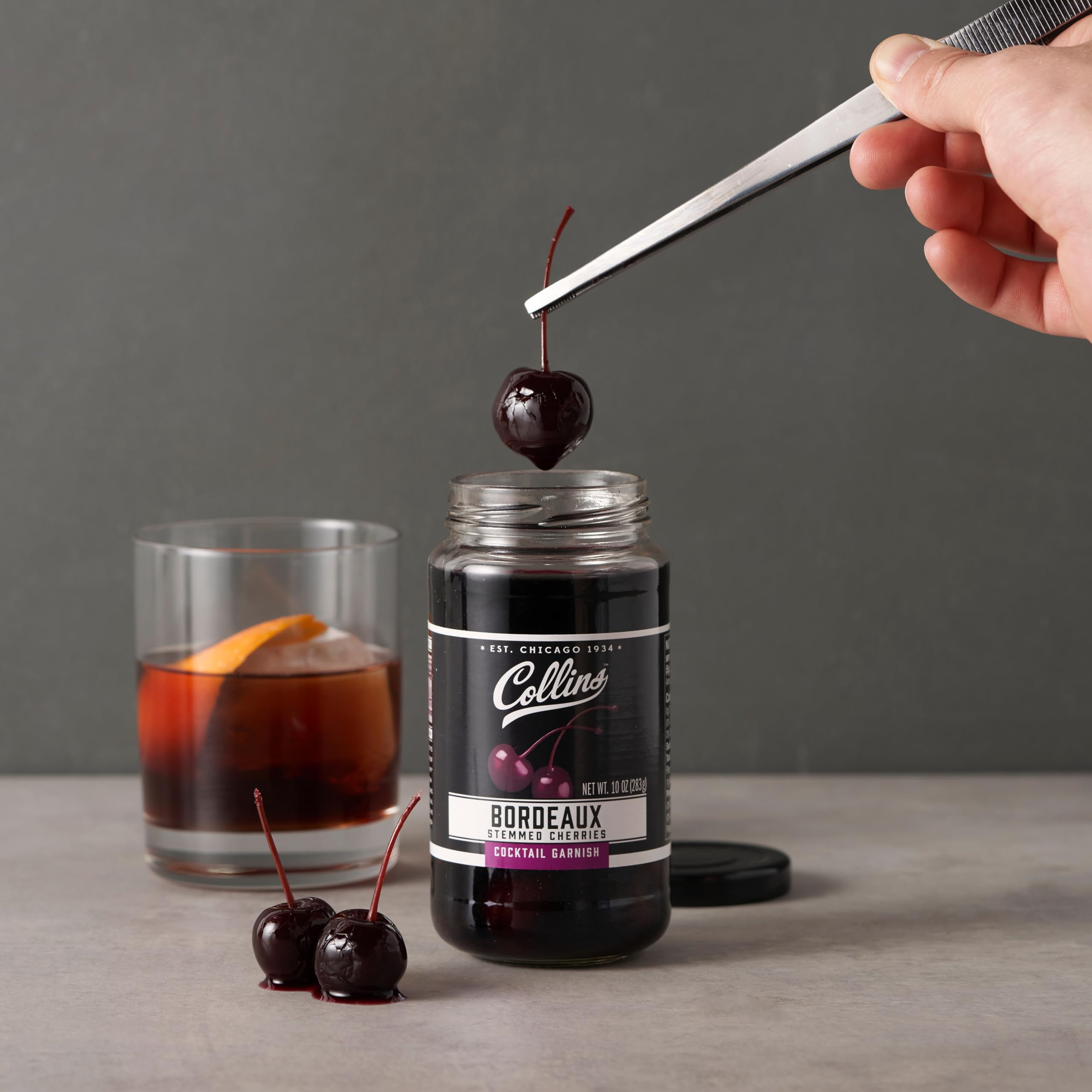 Collins Chicago stemmed Bordeaux cherries being poured, convenient ready-to-use garnish.