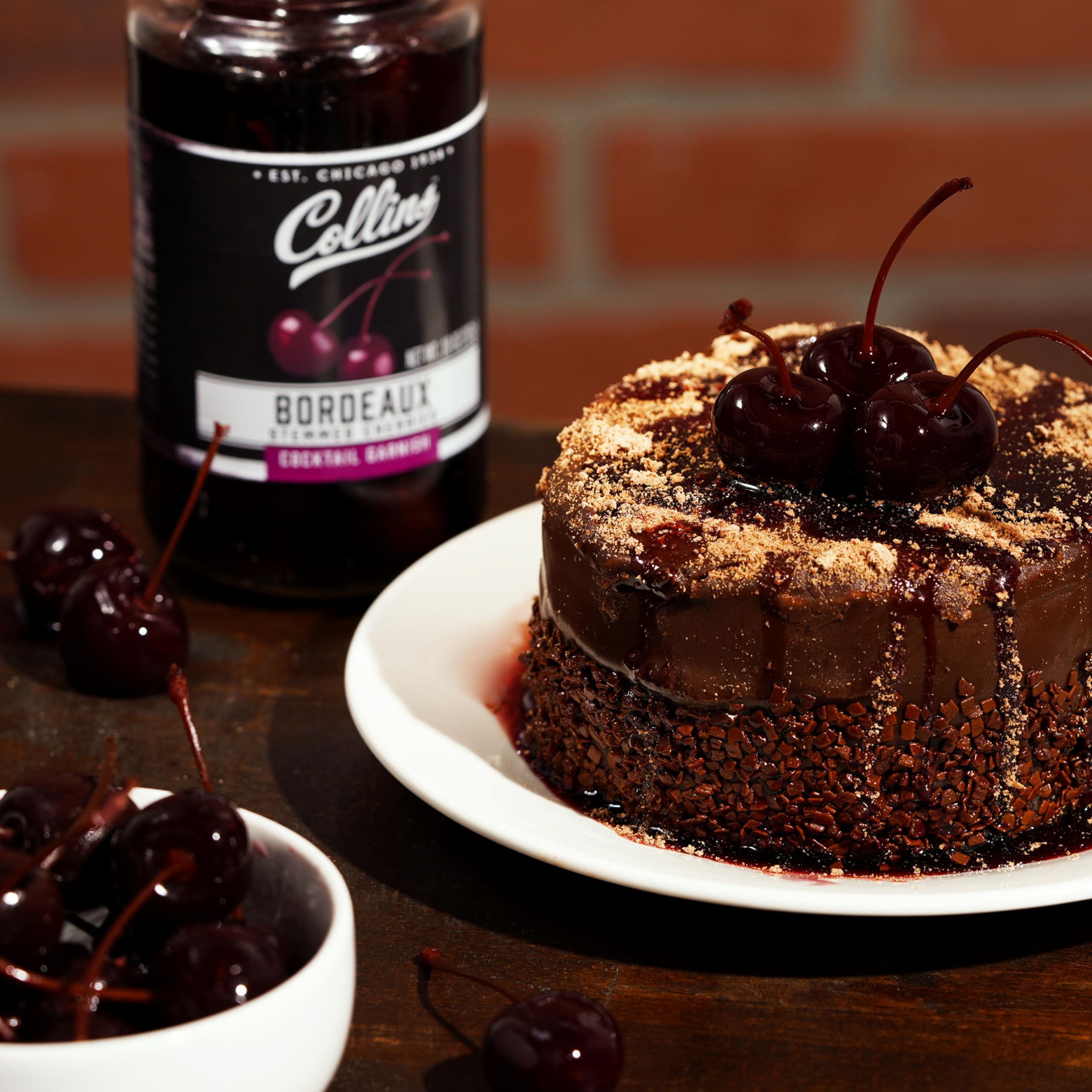 Collins Chicago stemmed Bordeaux cherries on dessert plate, gourmet topping option.