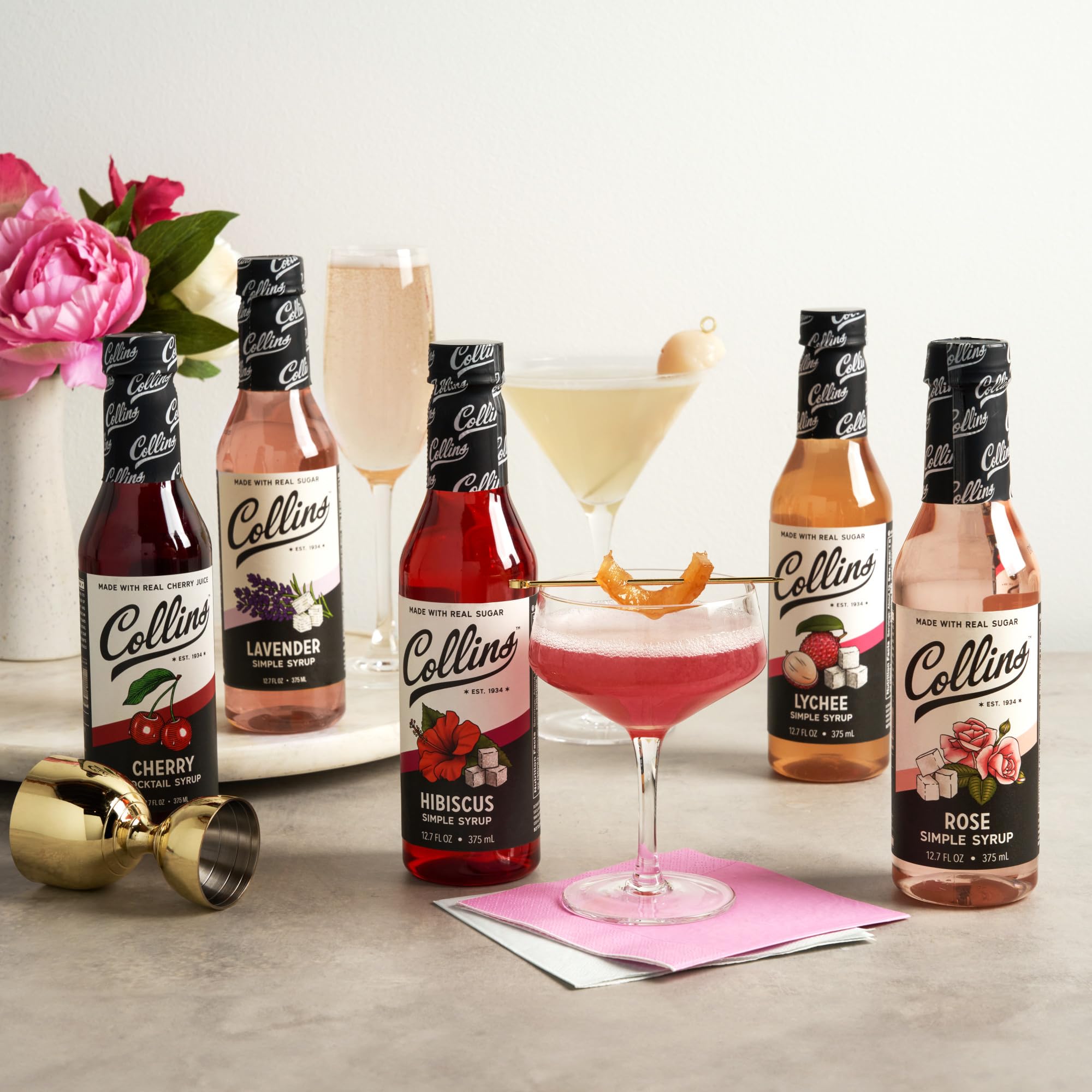 Collins Hibiscus Syrup spritz glass hints at premium, adaptable cocktails