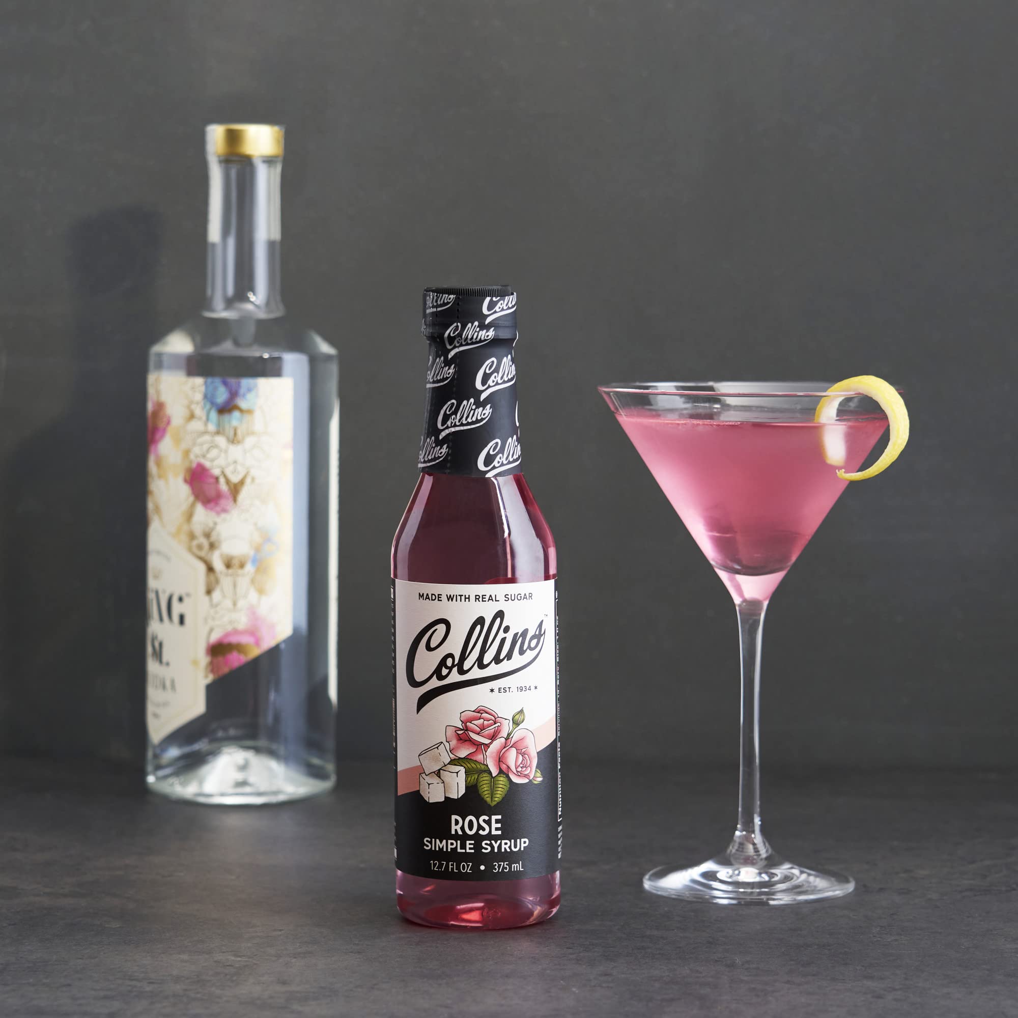 Pink-tinted punch made with Collins Rose Syrup for gatherings.