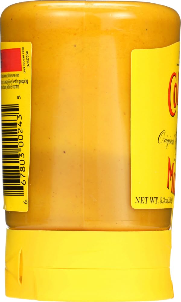 Colman's Mustard close-up texture highlighting smooth, pungent flavor.