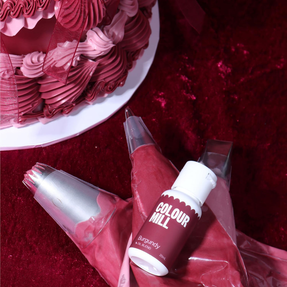 Colour Mill Burgundy fondant application demonstrates smooth color integration for rolled designs.