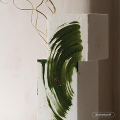 Colour Mill olive oil coloring blending in Swiss meringue to create soft hues.