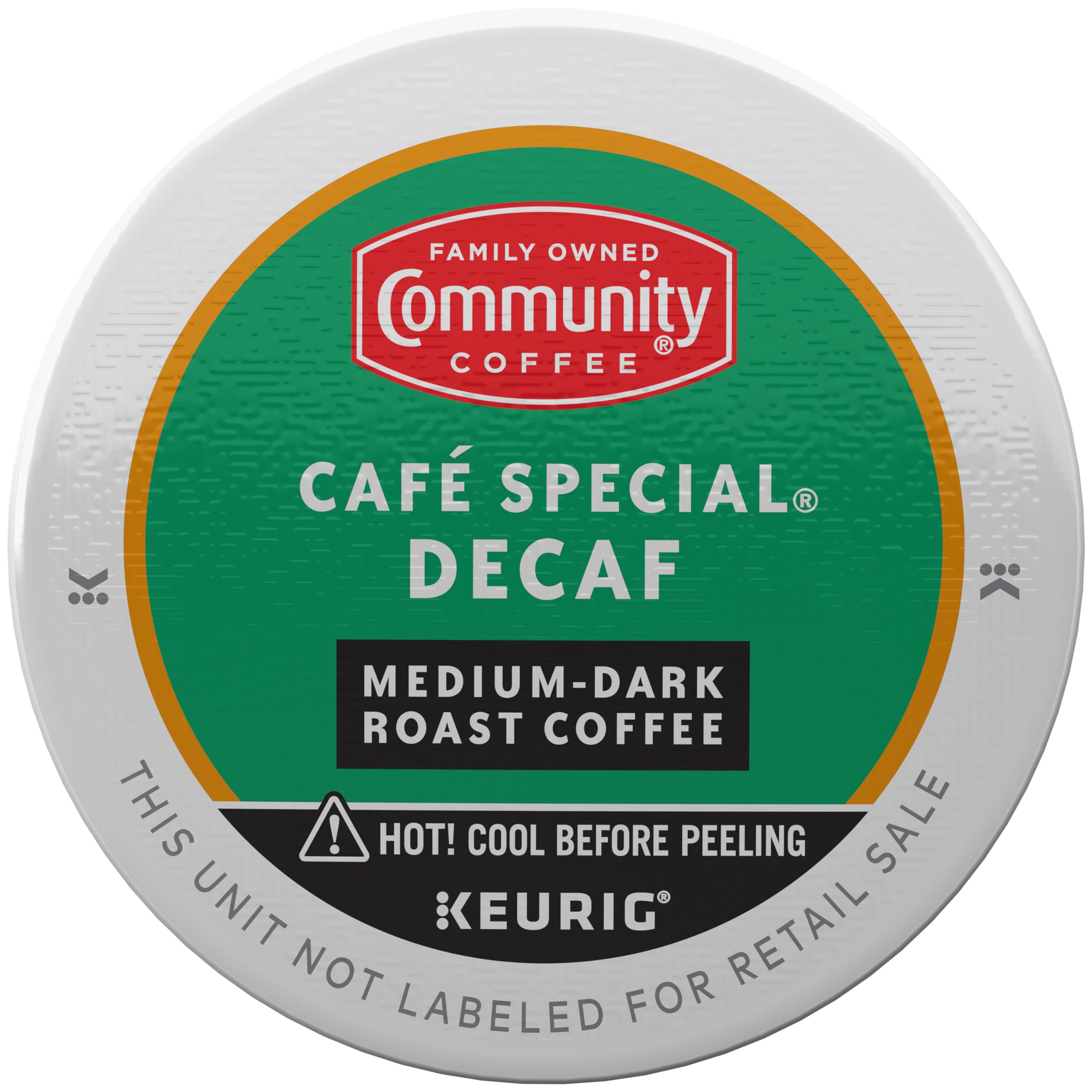 Community Coffee Café Special Decaf K-Cup Pod in a mug releasing rich aroma.