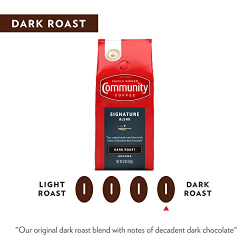 Steam rises from a mug of Community Coffee Signature Blend Dark Roast