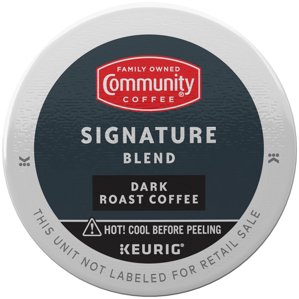 Close-up of Community Coffee Signature Blend dark roast K-Cup pods for premium single-serve convenience